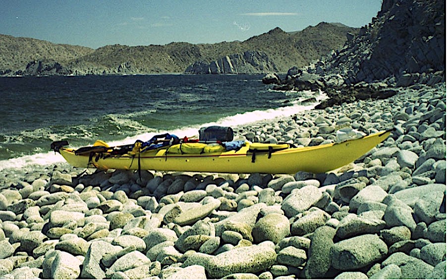 Sea kayak on rocky beach in sea of cortez, Baja California